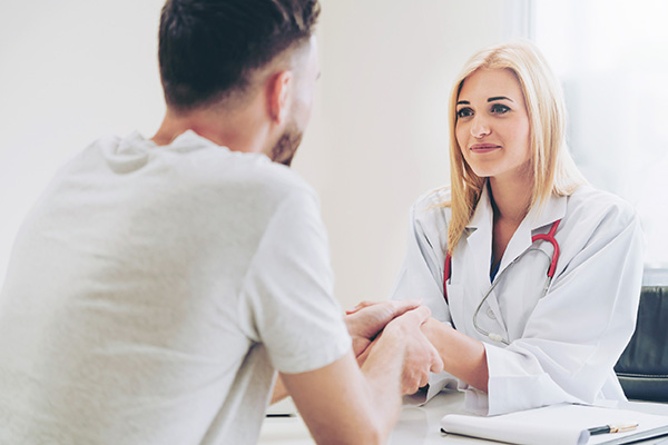 Image of a patient and doctor